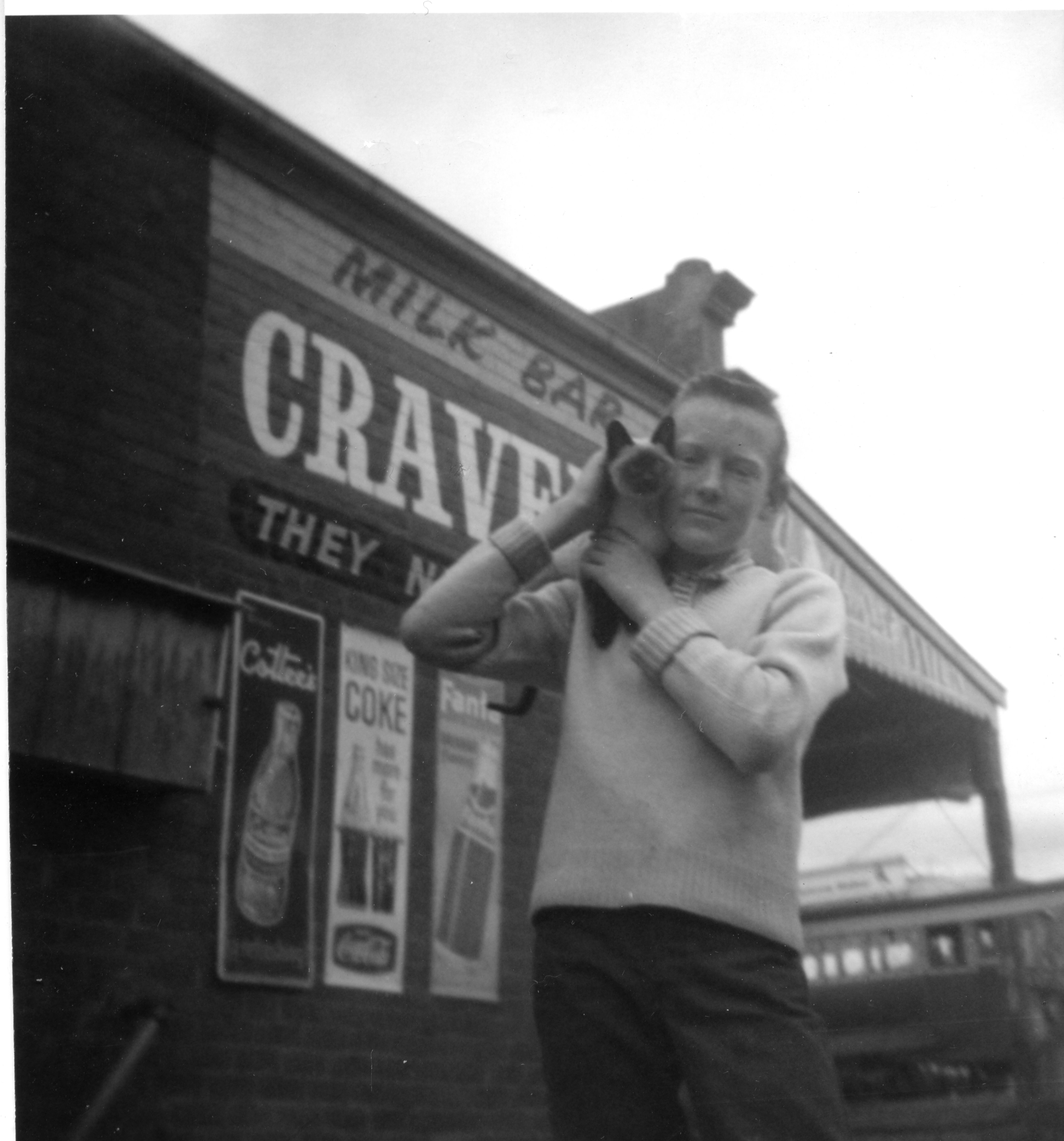 Barry with Misty at the shop, about 1964